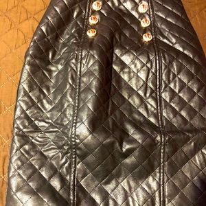 Black leather Quilted skirt with six gold buttons, size small. True to size. New